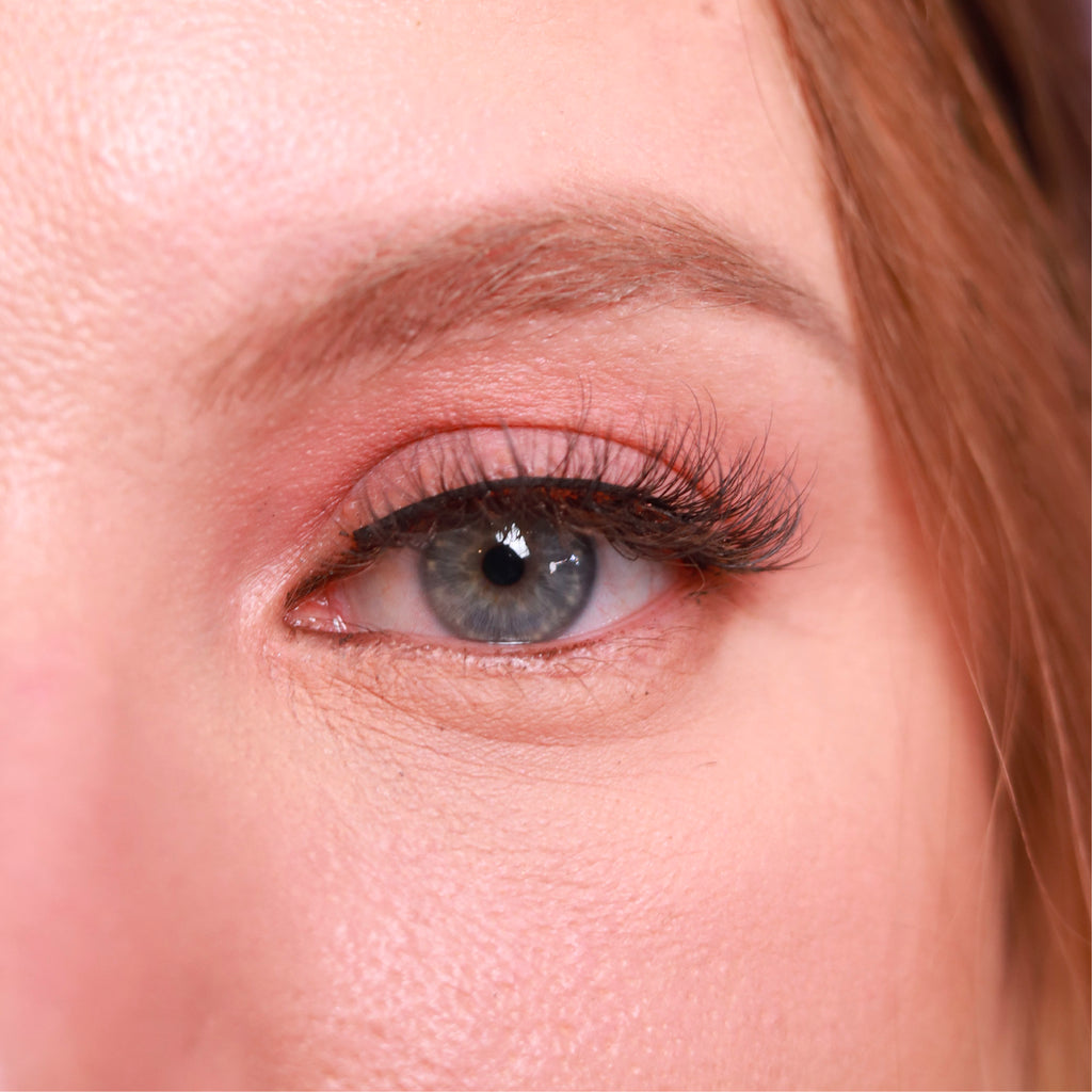 closeup of eye of caucasian woman wearing best fake eyelash extensions lowkey angelic cruelty free vegan false eyelashes | lulu lashes