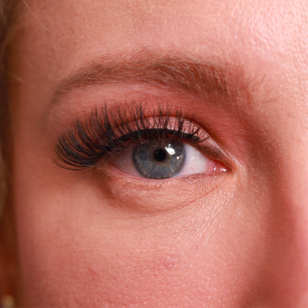 closeup of eye of caucasian woman wearing best magnetic fake eyelash extensions lowkey trendy cruelty free vegan false eyelashes | lulu lashes